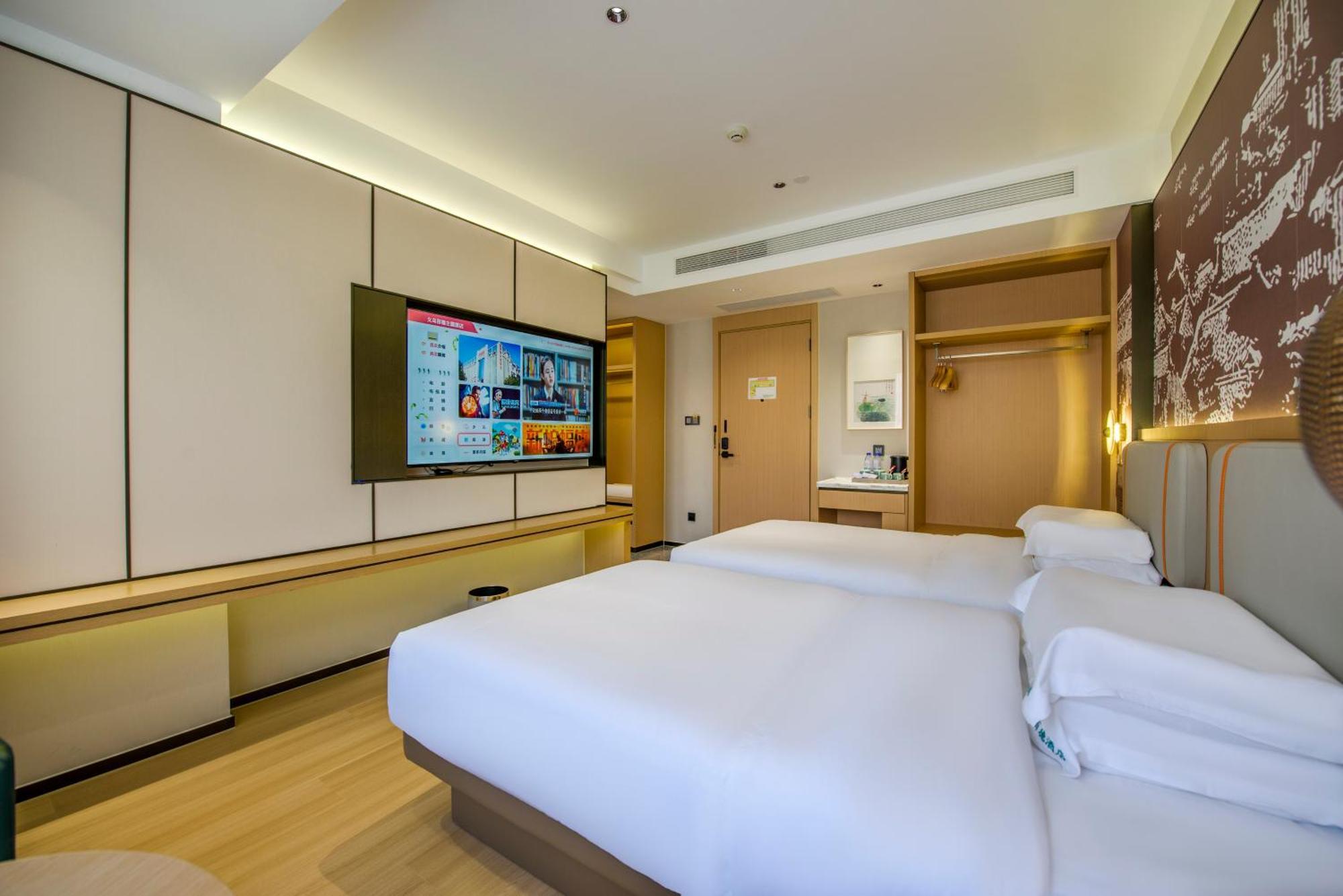 Yiwu Baide Theme Hotel Exteriör bild