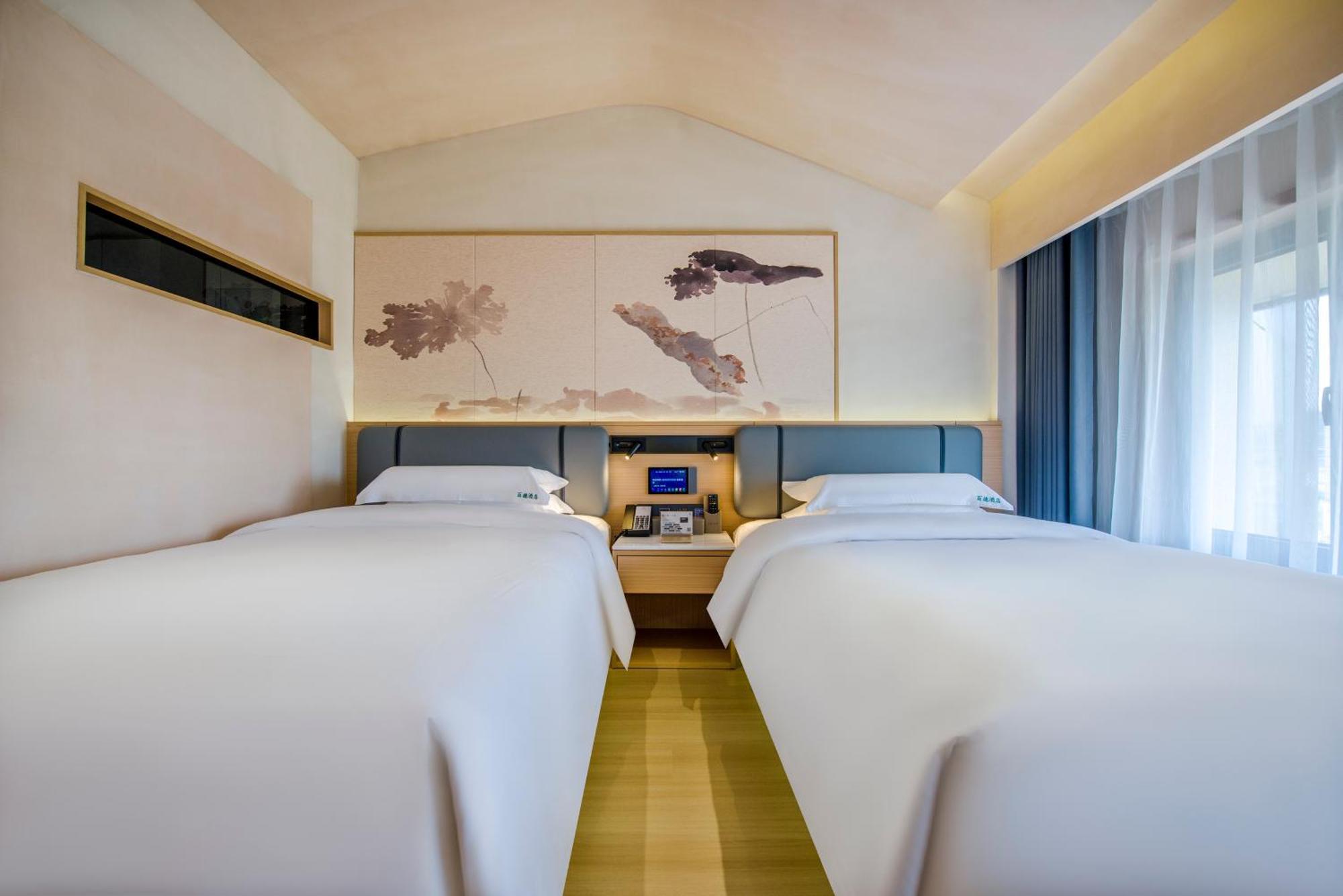 Yiwu Baide Theme Hotel Exteriör bild